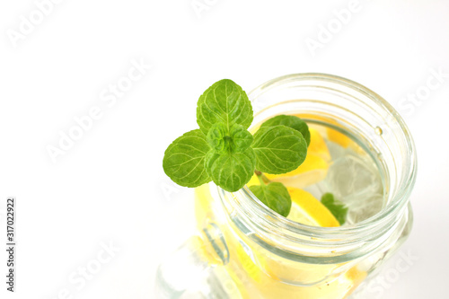 Glass of water, lemon and mint. Detox