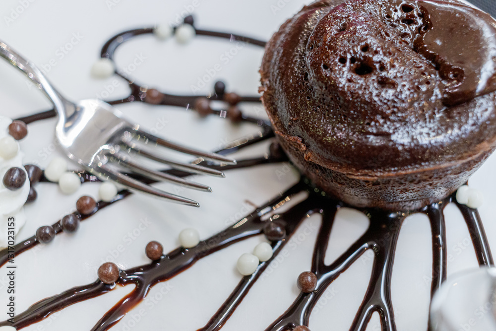 Fototapeta premium chocolate cake in a beauty dish