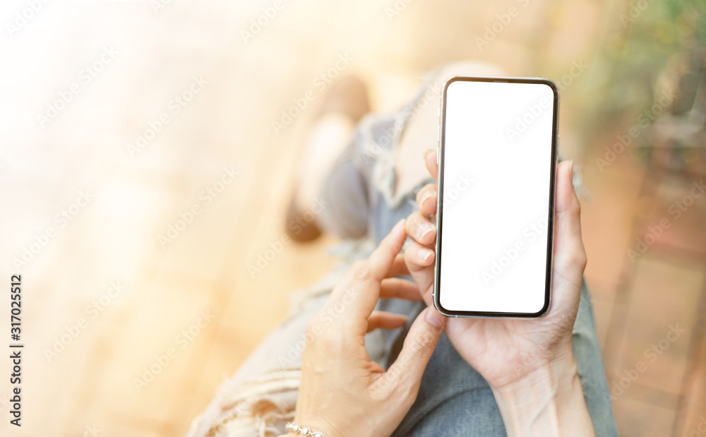Mockup image blank white screen cell phone.man hand holding texting using mobile.background empty space for advertise text.people contact marketing business,technology Mockup image blank white screen cell phone.man hand holding texting using mobile.background empty space for advertise text.people contact marketing business,technology