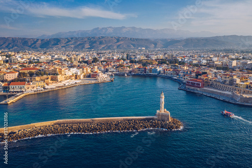 Picturesque old port of Chania. Landmarks of Crete island. Greece. Aerial view of the beautiful city of Chania with it's old harbor and the famous lighthouse, Crete, Greece.