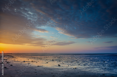 Sonnenuntergang im Wattenmeer Nordseeküste photo