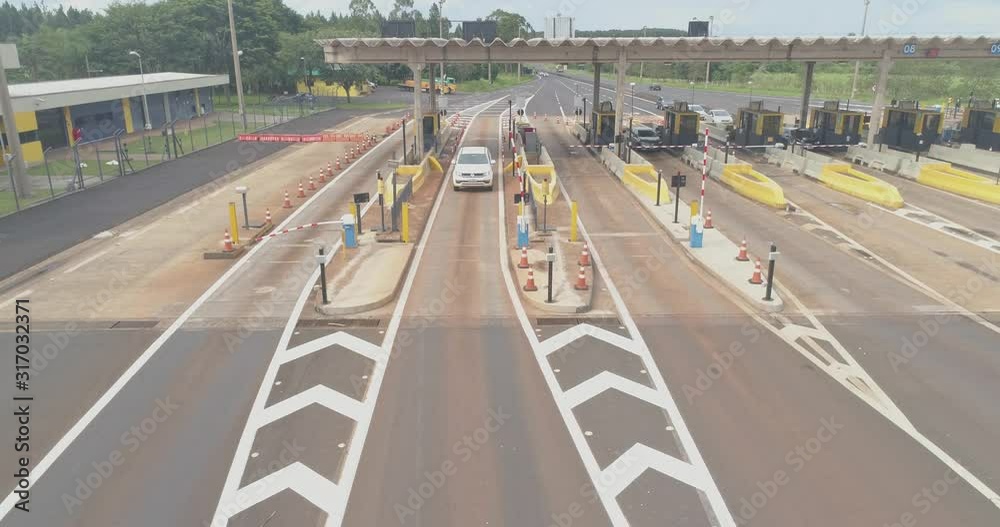 Aerial image highway toll plaza and speed limit, view of automatic paying lanes, non-stop. Aerial image highway toll plaza and speed limit, view of automatic paying lanes, non-stop.