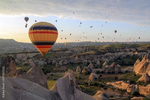 Air baloons flying at sunrise in Cappadocia