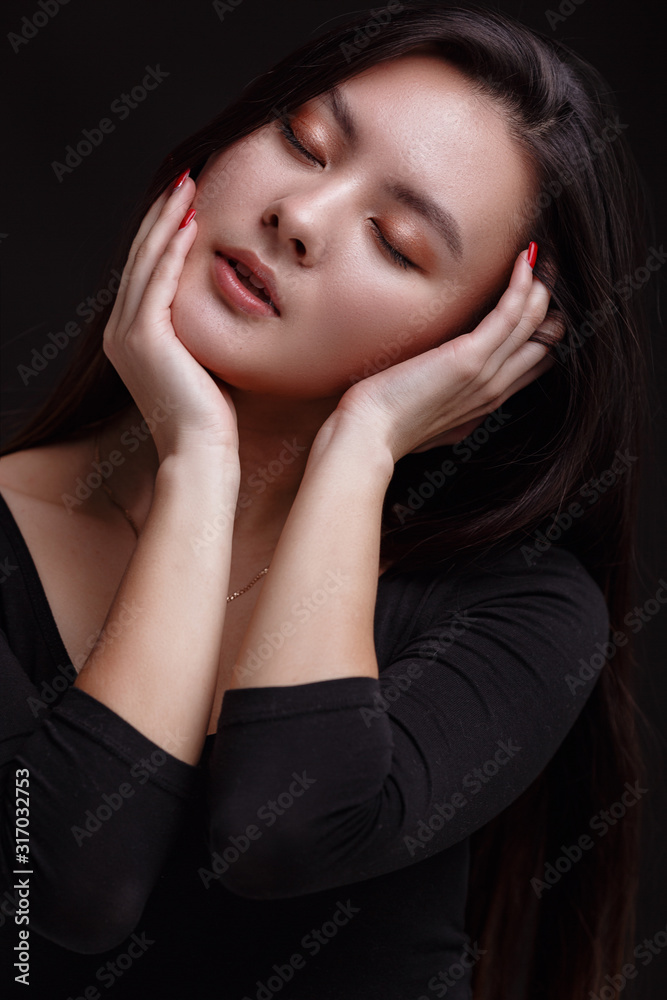 Portrait of beautiful asian woman with a black healthy hair Portrait of beautiful asian woman with a black healthy hair