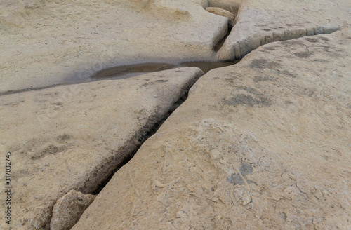 Light yellow rock surface texture background