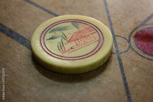 View of stricker used in carrom board game. Multiplayer board game with good fun time.