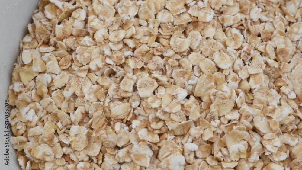 Energy Balls. Step by step recipe cooking. Slow motion closeup oat flakes Energy Balls. Step by step recipe cooking. Slow motion closeup oat flakes