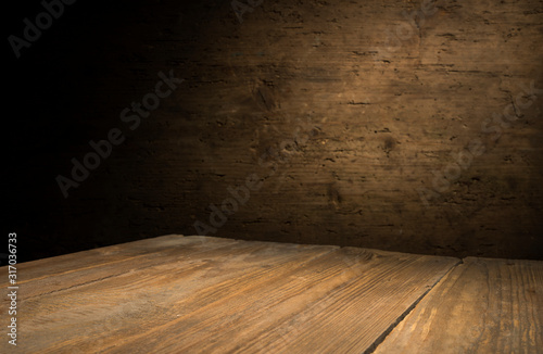 wood brown grain texture, dark wall background, top view of wooden table © kishivan