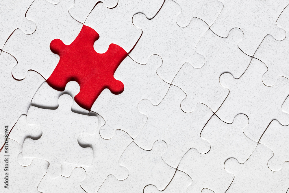 Jigsaw puzzle with missing piece. Missing puzzle pieces. Concept image of unfinished task. Completing final task, missing jigsaw puzzle pieces and business concept with a puzzle piece missing. Jigsaw puzzle with missing piece. Missing puzzle pieces. Concept image of unfinished task. Completing final task, missing jigsaw puzzle pieces and business concept with a puzzle piece missing.
