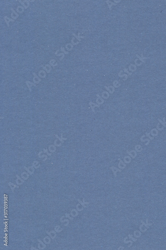 Blue vintage rough sheet of carton. Recycled environmentally friendly cardboard paper texture. Simple minimalist papercraft background.
