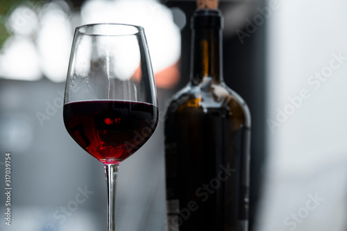 red wine, in glasses, on wooden bar,