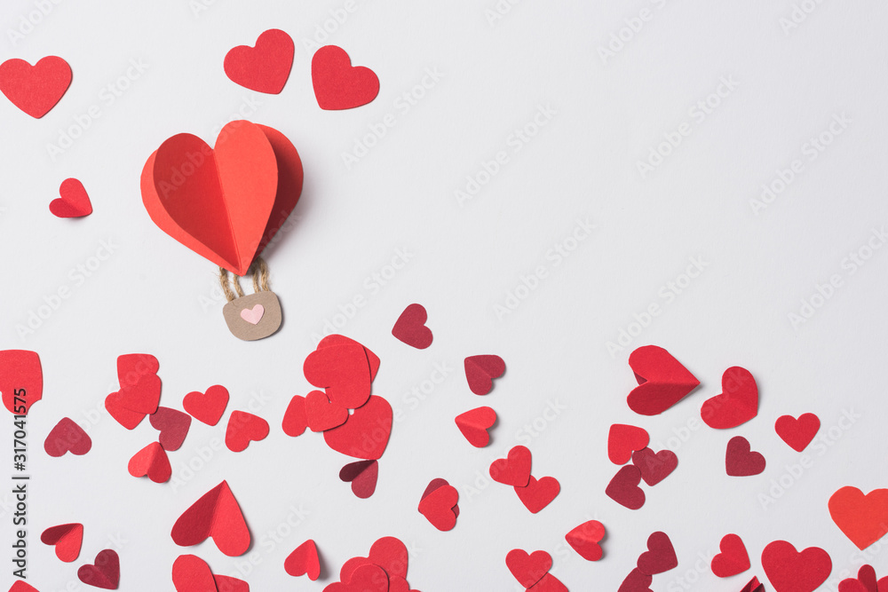 top view of red heart with padlock among hearts on white background