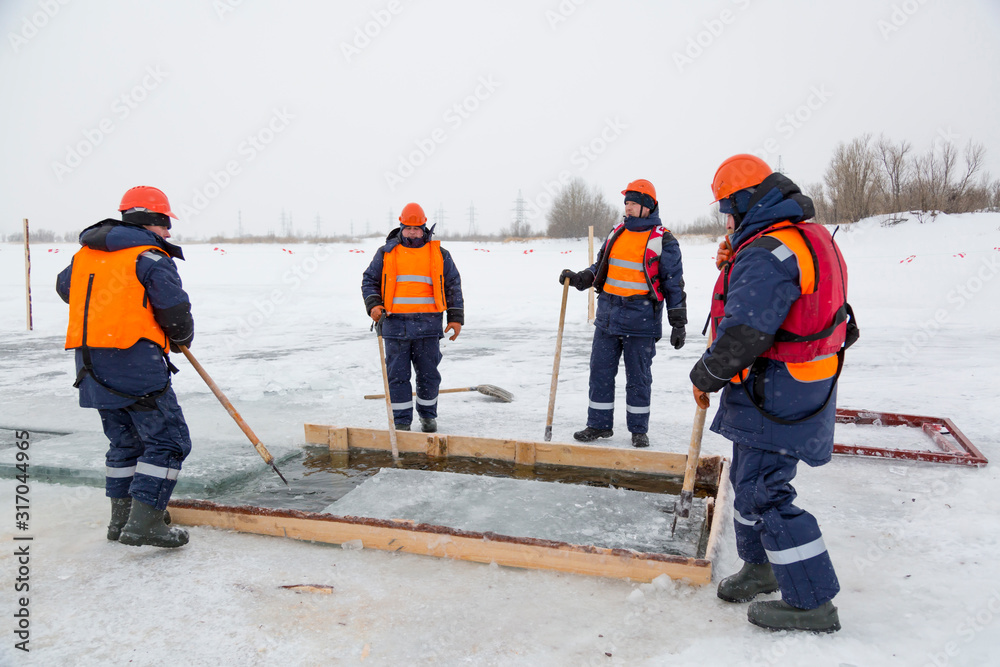 Sailors work at the lane with a fenced wooden formwork Sailors work at the lane with a fenced wooden formwork
