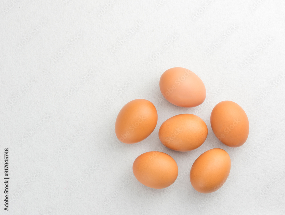 Six eggs placed on the floor isolate on white background. Six eggs placed on the floor isolate on white background.