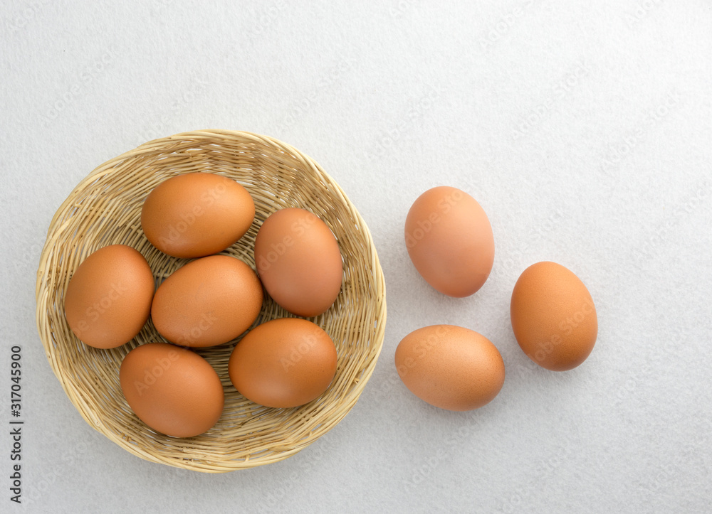 Eggs placed in a woven wooden basket. Eggs placed in a woven wooden basket.