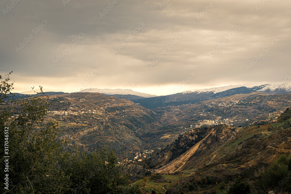 The mountains of Lebanon were once shaded by thick cedar forests and tree is the symbol of country. Beautiful landscape of mountainous town in winter, Eco tourism, Chouf district with large vistas The mountains of Lebanon were once shaded by thick cedar forests and tree is the symbol of country. Beautiful landscape of mountainous town in winter, Eco tourism, Chouf district with large vistas