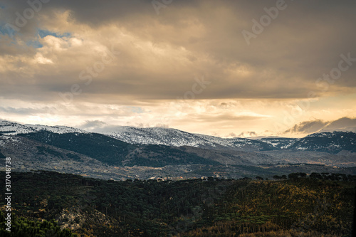 The mountains of Lebanon were once shaded by thick cedar forests and tree is the symbol of country. Beautiful landscape of mountainous town in winter  Eco tourism  Chouf district  with large vistas