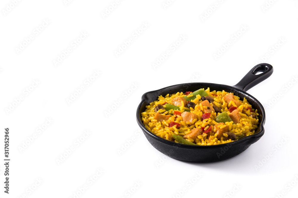 Fried rice with chicken and vegetables on frying iron pan isolated on white background. Copy space Fried rice with chicken and vegetables on frying iron pan isolated on white background. Copy space