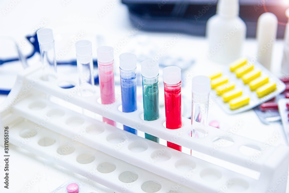 testing pills and test tubes. The concept of research on vaccination, pharmacology and biotechnology of drugs. science and medicine. testing pills and test tubes. The concept of research on vaccination, pharmacology and biotechnology of drugs. science and medicine.