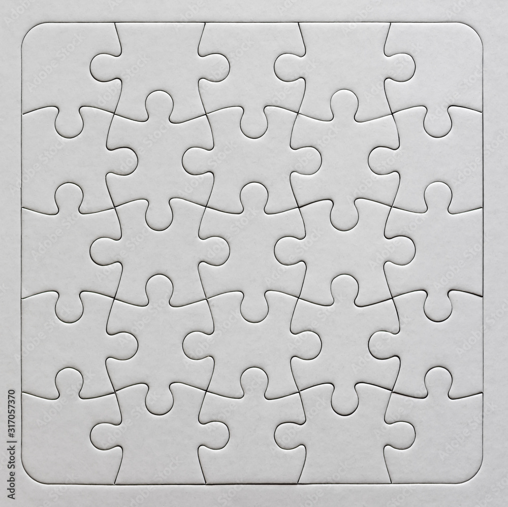 Close up on blank, white jigsaw puzzle texture Close up on blank, white jigsaw puzzle texture
