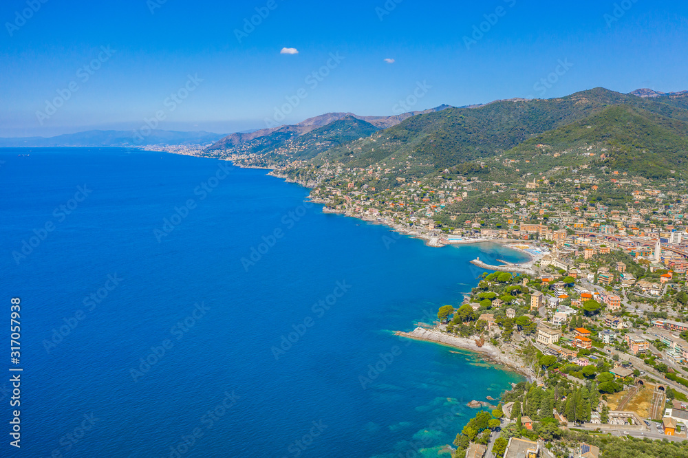 Rocky bay in Italy. Aerial drone view on Adriatic sea beach, Camogli, liguria.