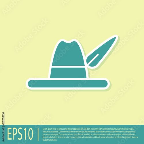 Green Oktoberfest hat icon isolated on yellow background. Hunter hat with feather. German hat. Vector Illustration