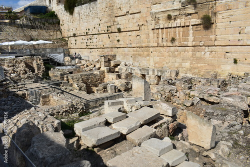  Remains of Robinson's Arch along the western wall of the Temple Mount. It was built as part of the expansion of the Second Temple, initiated by Herod the Great, at the end of the 1st century BCE. photo