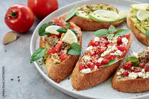 Bruschetta with vegetables and cheese.