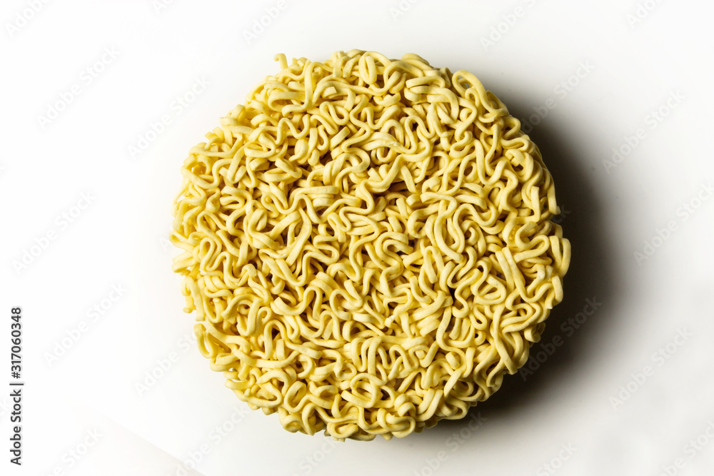 Raw instant noodles isolated on white background close up Raw instant noodles isolated on white background close up