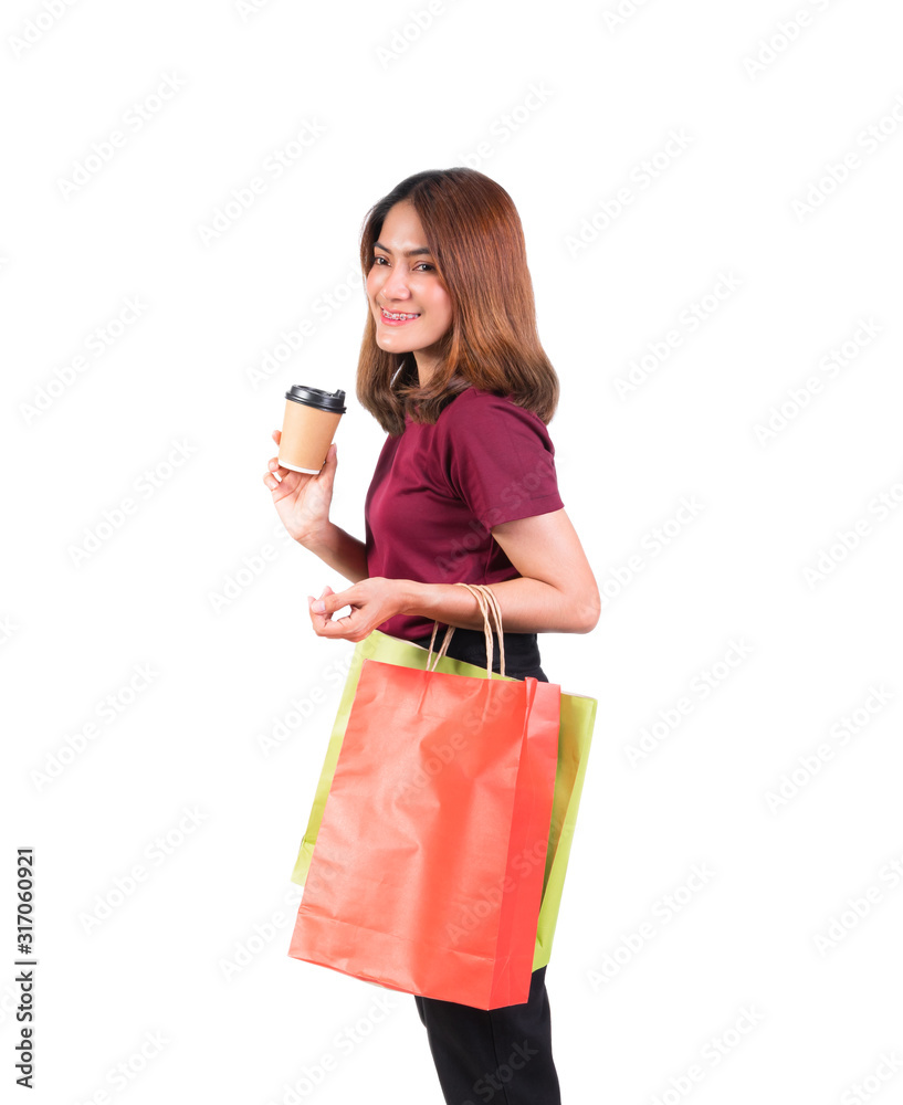 woman pretty smiling holding paper bags and Coffee carton cup in shopping. on white background and look at camera woman pretty smiling holding paper bags and Coffee carton cup in shopping. on white background and look at camera