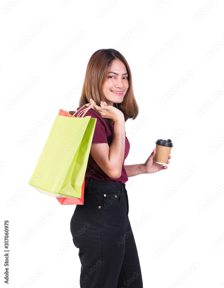 woman pretty smiling holding paper bags and Coffee carton cup in shopping. on white background and look at camera woman pretty smiling holding paper bags and Coffee carton cup in shopping. on white background and look at camera