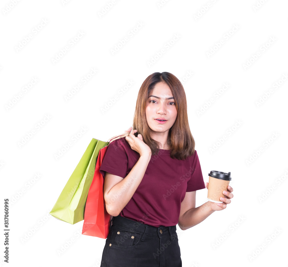 woman pretty smiling holding paper bags and Coffee carton cup in shopping. on white background and look at camera woman pretty smiling holding paper bags and Coffee carton cup in shopping. on white background and look at camera