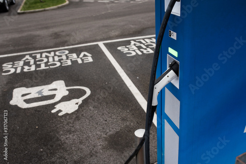 Car battery charging point and the white plug.