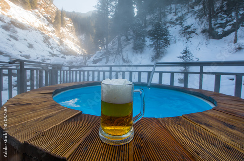 beer mug  thermal pool in the mountains in winter