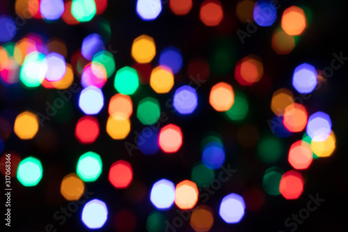 Festive rainbow colored blurred background full bokeh