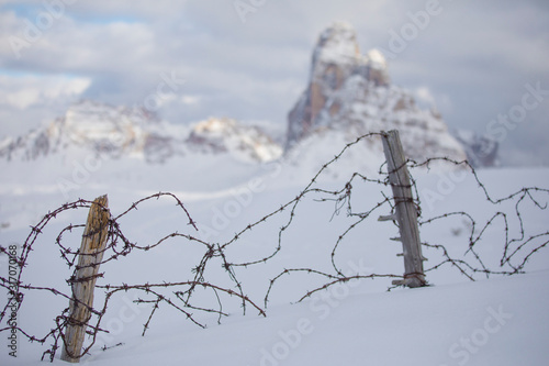 Traces of the great war from Piana Mount, on background the Tre Cime di Lavaredo and the Dolomites of Sesto, Auronzo di Cadore, Veneto, Italy