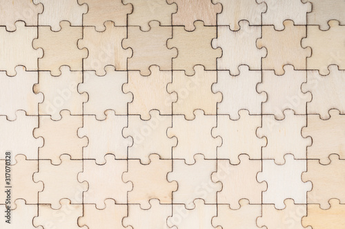 Texture assembled wooden puzzles background