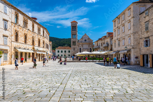 Main square in old medieval town Hvar. Hvar is one of most popular tourist destinations in Croatia in summer. Central Pjaca square of Hvar town, Dalmatia, Croatia. photo
