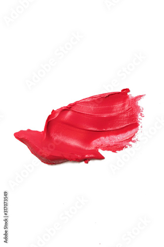 Smudged red lipstick isolated on white background	