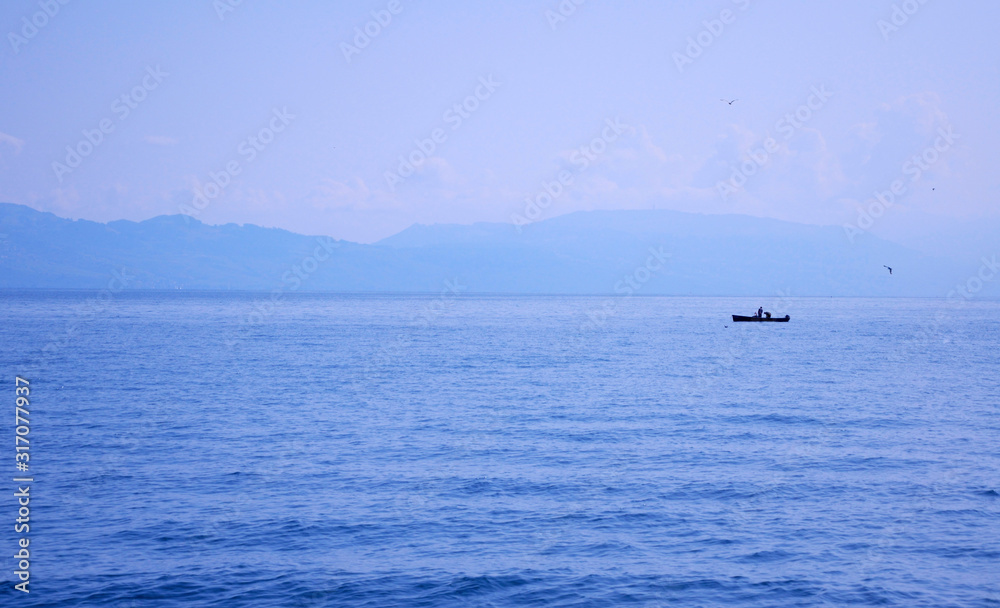 Fischerboot auf dem Genfer See