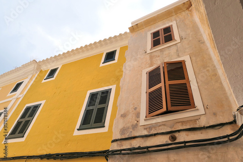 Windows shutters on buildings in old town Ciutadella, Menorca.