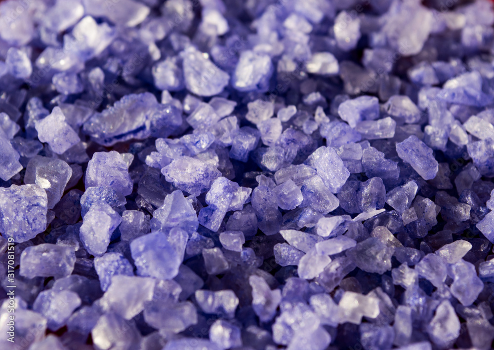 Background with violet crystals. The texture of the salt.