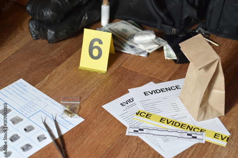Evidence Chain Of Custody Labels And Brown Paper Bag With Fingerprints evidence-chain-of-custody-labels-and-brown-paper-bag-with-fingerprints