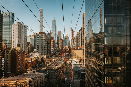 Photography Between the scyscapers ofNew York City, seen from Roosevelt Island Tramway