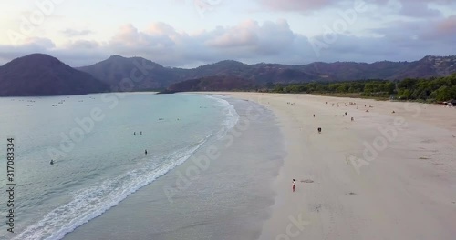 Aerial dolly forward above senggigi beach on lombok island, indonesia photo