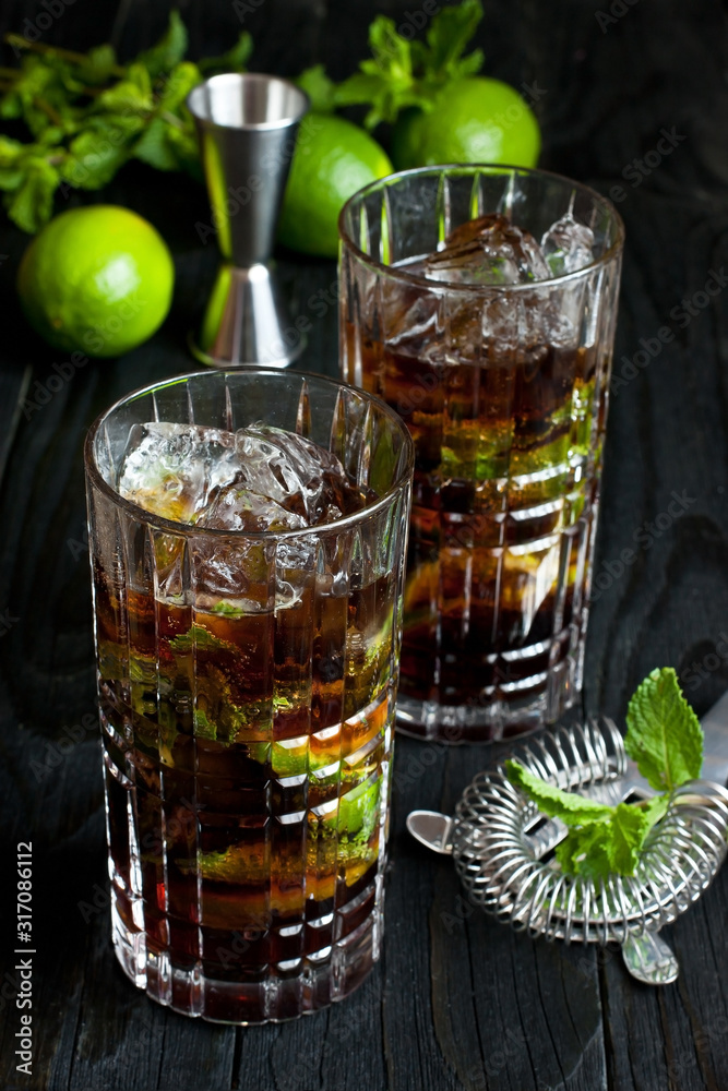  Cuba libre cocktail, iced drink with lime,  cola, rum  and mint