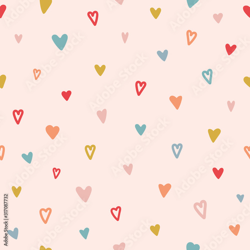 Heart seamless pattern. Color hand drawn heart texture. Valentines Day card. Color doodle hearts in different shapes. Romantic wallpaper design with symbol of love. Vector illustration