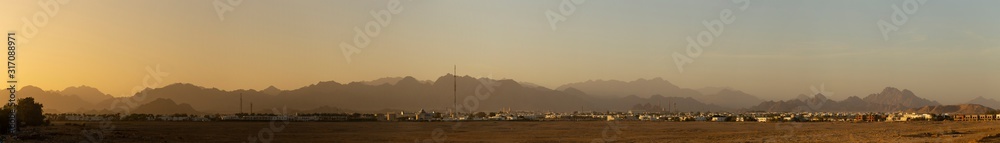 Sharm El Sheikh, sunset, outskirts of the city. Egypt. Mountains of the Sinai Peninsula. Panoramic, fantastic landscape.