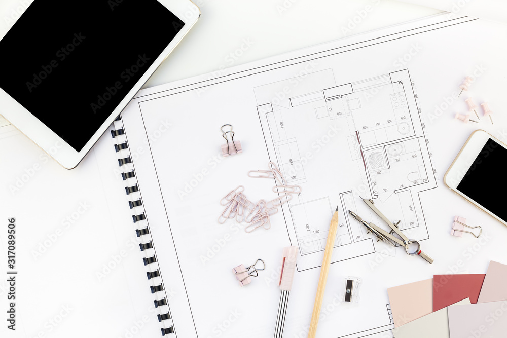 Interior designer table workplace with house plan Interior designer table workplace with house plan