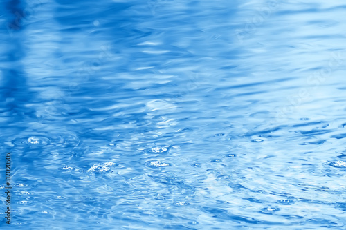 concept blue abstract background water / ocean, lake waves on water, reflection of ripples on the river